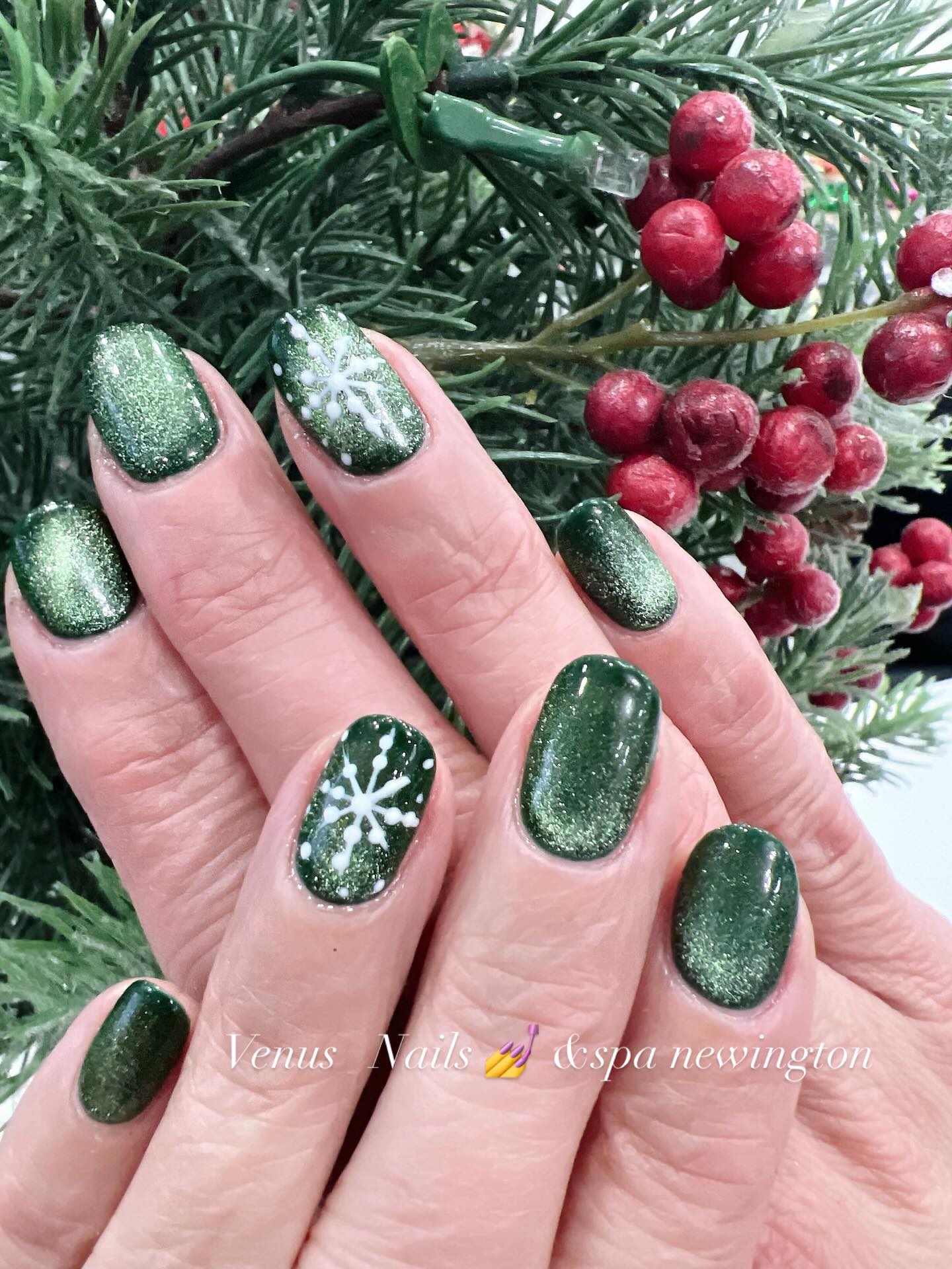Emerald cat-eye gel with snowflake art